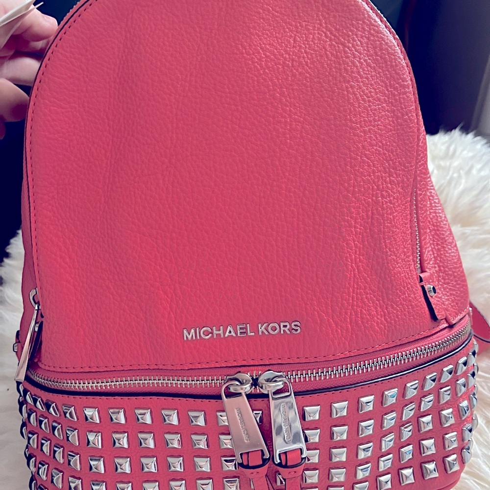 Micheal Kors coral leather backpack -silver studs/hardware